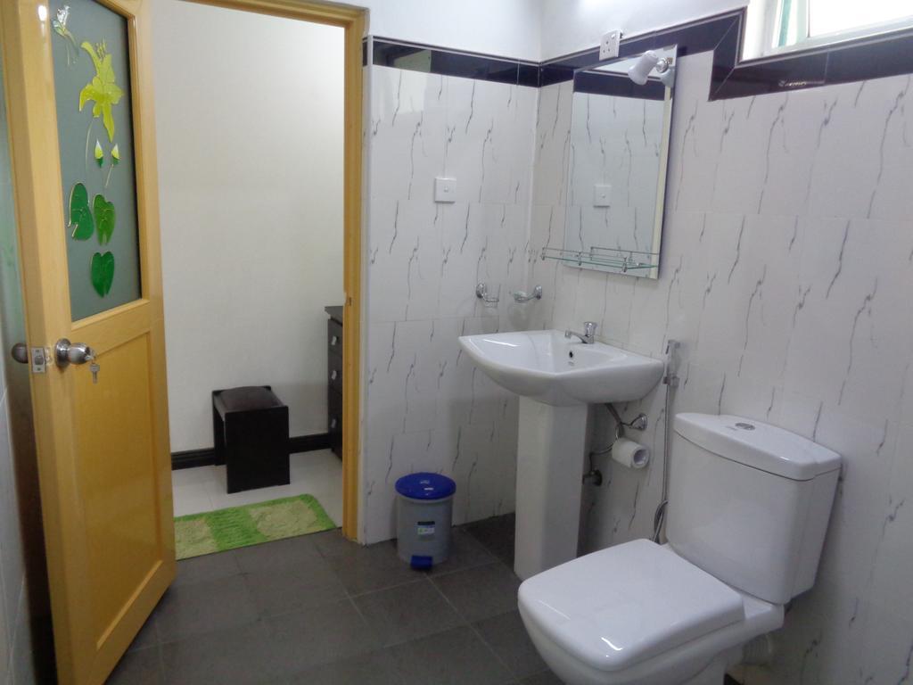 Man Guest Polonnaruwa Hotell Rum bild